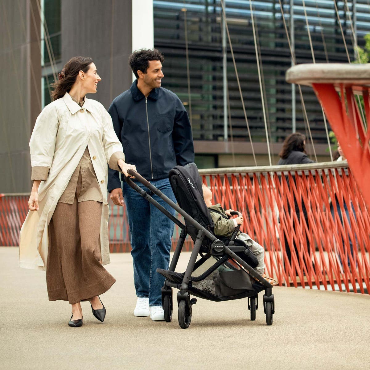 Nuna SWIV button-activated 360-degree swivel wheels, lifestyle