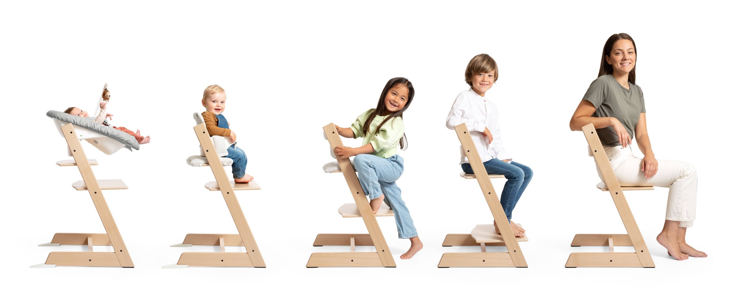 Five stages of the Tripp Trapp Chair, from the Newborn Set to an adult